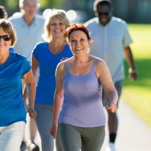 Adults participating in a wellness support group focused on healthy lifestyle habits and accountability.
