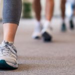 Adults participating in the Worth Township Indoor Walking Club inside the township building.