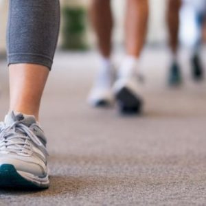 Adults participating in the Worth Township Indoor Walking Club inside the township building.